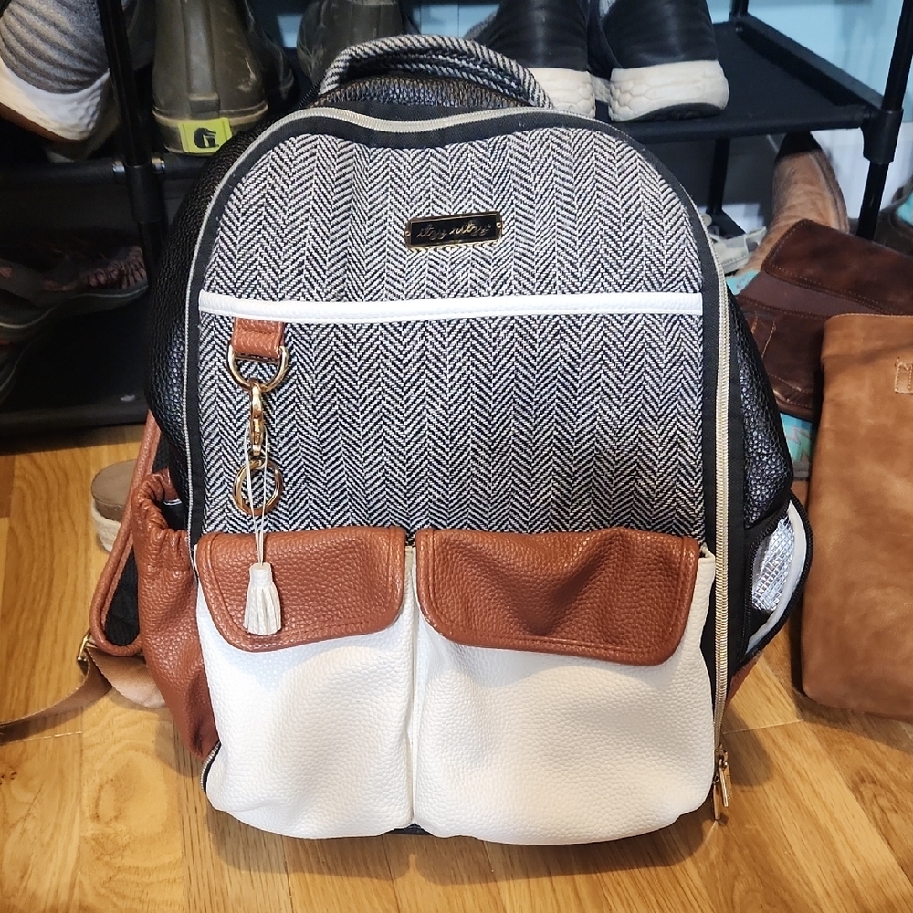 Stylish Herringbone Backpack with Brown and White Accents